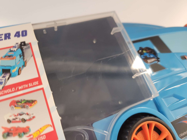 OUTLET Hot Wheels Transporter na 14 aut + 1 auto i znaki drogowe WADLIWY