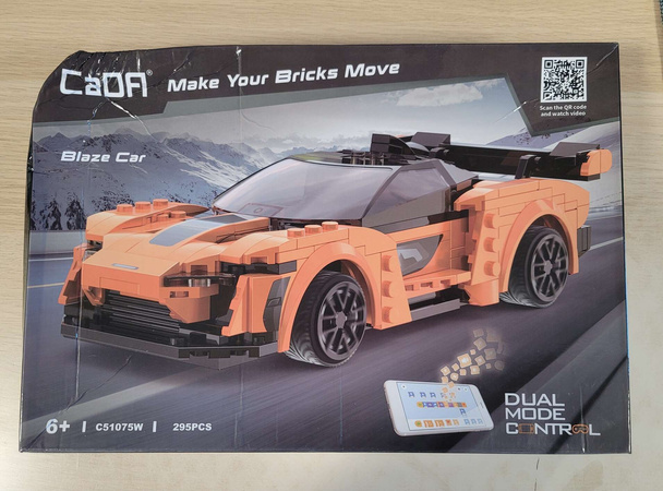 OUTLET Klocki konstrukcyjne CaDA Zdalnie sterowany samochód Blaze Car Pomarańczowe auto wyścigowe Pojazd sportowy RC Dual Mode 295 elementów USZKODZONE OPAKOWANIE