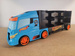 OUTLET Hot Wheels Transporter na 14 aut + 1 auto i znaki drogowe WYBRAKOWANY