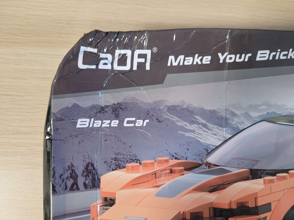 OUTLET Klocki konstrukcyjne CaDA Zdalnie sterowany samochód Blaze Car Pomarańczowe auto wyścigowe Pojazd sportowy RC Dual Mode 295 elementów USZKODZONE OPAKOWANIE